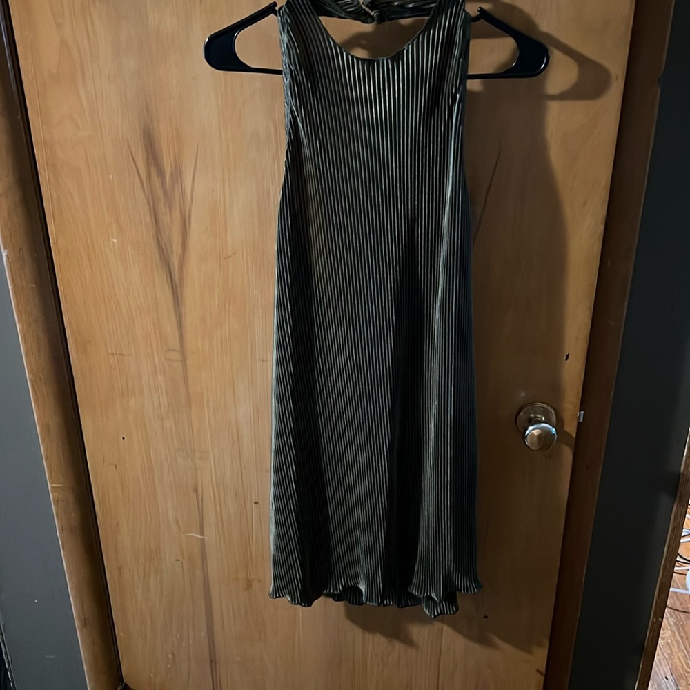 Olive green mini dress. Breathable material a little see through and backless.